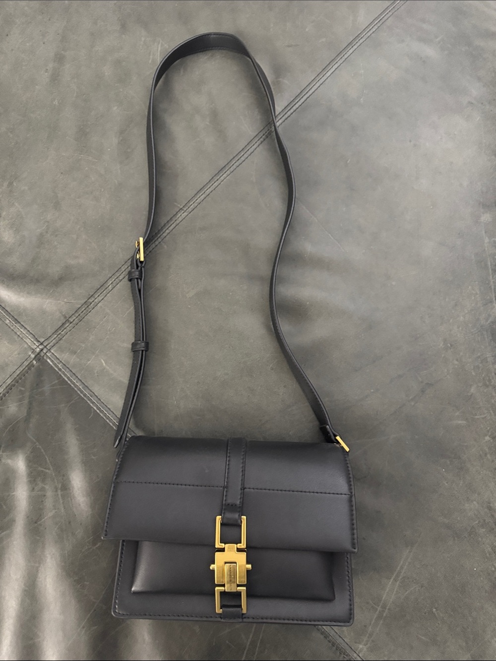 Charles & Keith Black Leather Crossbody Bag with Gold Hardware